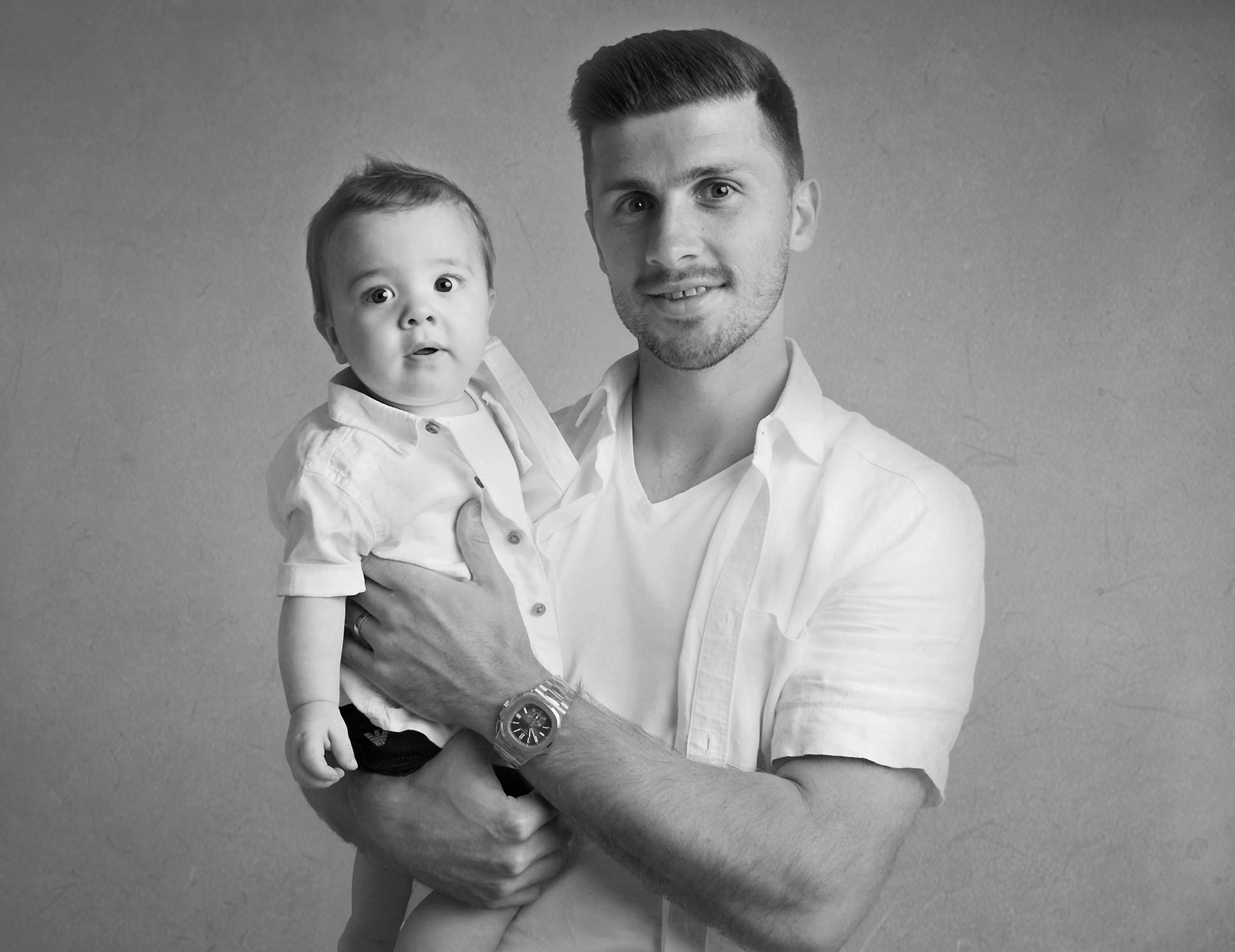 "Shane Long and his beautiful baby son portrait " 